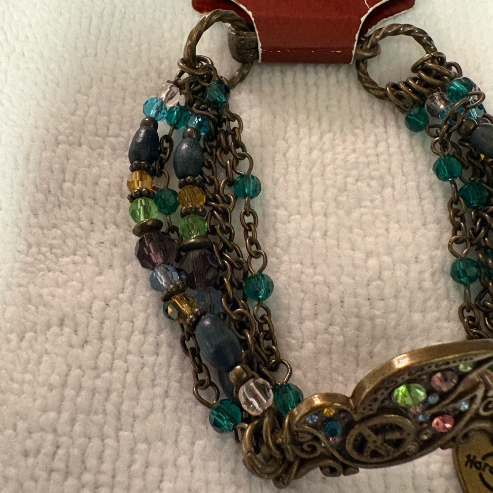 NWT Hard Rock Cafe Teal Green Purple Multicolor Beaded Bracelet - Picture 2 of 8